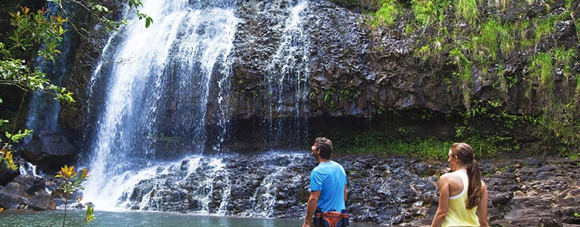 Couple looking at waterfall